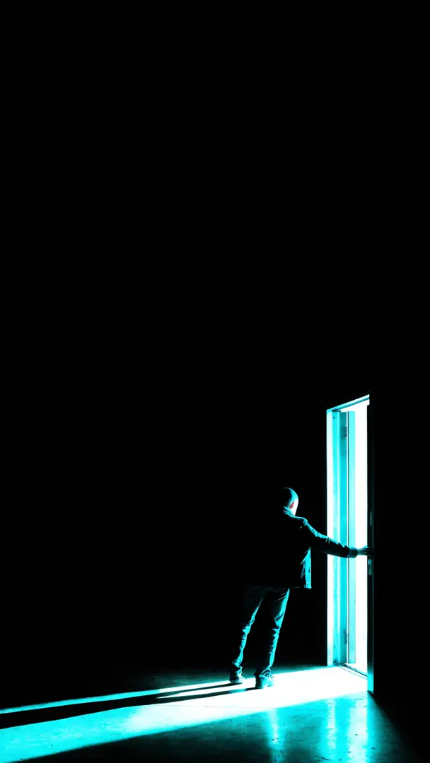 A figure stepping through a doorway into cyan light